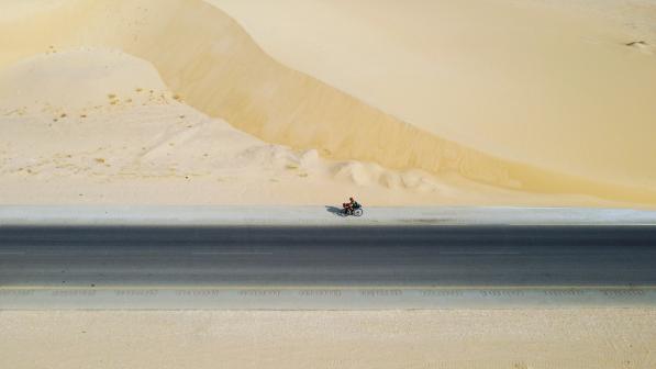 CYCLE121_COVER_2-Saudi, desert dunes, overhead copy.jpg