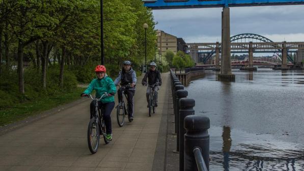 A group ride along a river  Photo by Stewart Prince